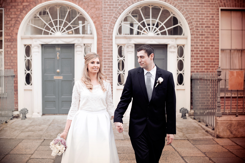 The bride and groom pictured in Georgian Dublin in a Dublin Christmas Wedding Photograph