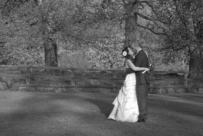 Portrait-of-the-bride-and-groom-kissing-in-the-grounds-of-Leixlip-Manor