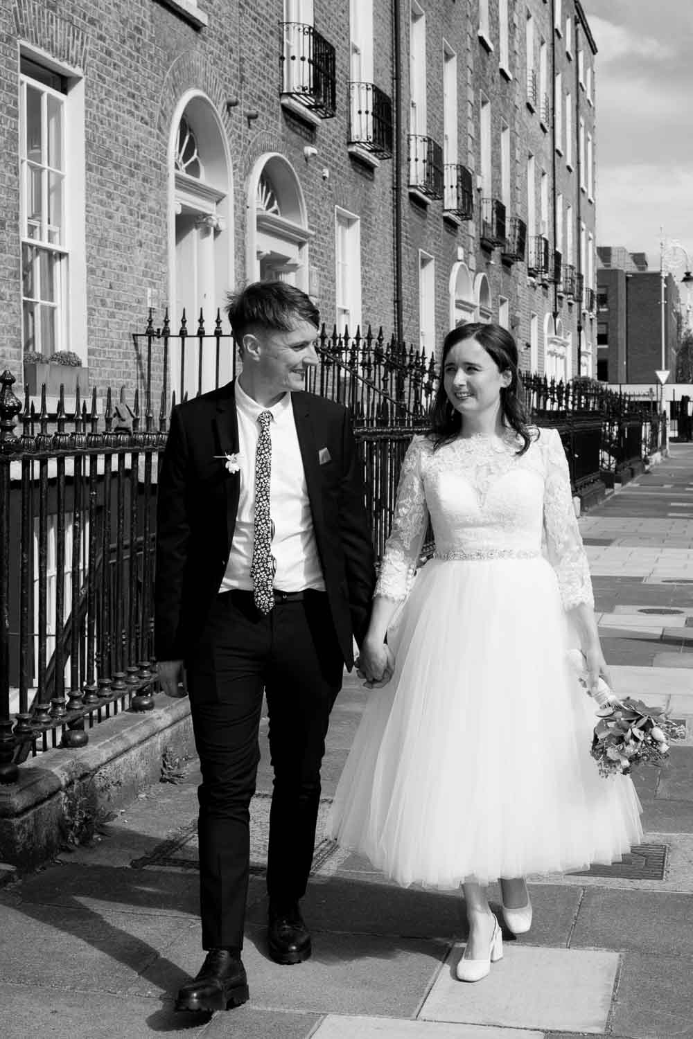 Registry Office Photography of the bride and groom walking through Georgian Dublin following their Registry Office wedding