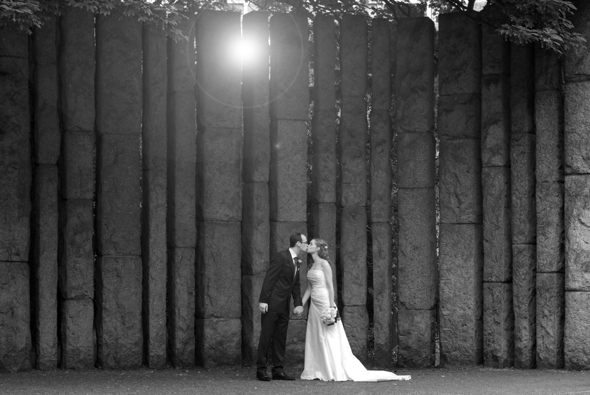 The bride and groom pose in St. Stephen's Green for a Fallon & Byrne Wedding Photo